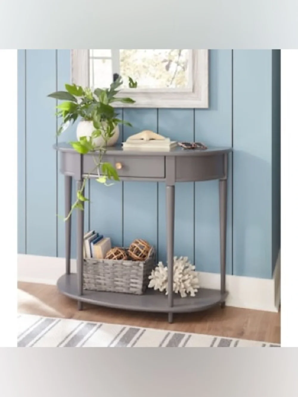 Allen +Roth . This small, grey decorative basket by allen + roth is made of poly